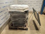 a pile of folded up clothes on a pallet