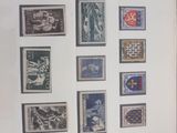 a picture of a picture of a collection of stamps on a wall