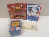a box of pizza and a package of cards on a table