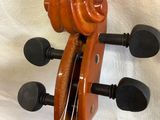 an image of a close up of a violin on a white background