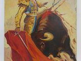 peinture d'un taureau et d'un matamoo avec une cape rouge