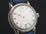 an image of a close up of a wrist watch on a black background
