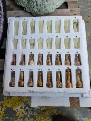 a lot of bottles that are sitting on a pallet