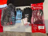 many items that are on a table that include gloves, gloves, gloves, gloves, gloves, and other items