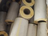 many rolls of toilet paper in a cardboard box