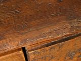 a close up of a piece of wood with a hole in it