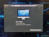 a computer screen with a message on it in front of a blue background