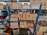many boxes on the shelves in the warehouse