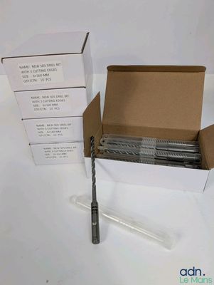 une boîte contenant un stylo et une autre boîte contenant elle-même un stylo