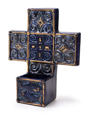 a blue and gold cross shaped box on a white background