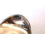 a spoon that is sitting on top of a table