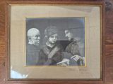 an old picture of a man and two women with a bird