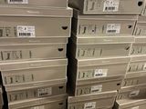 boxes stacked on top of each other in a warehouse
