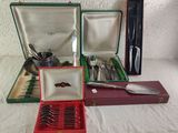 a red box with silverware in it sitting on a table