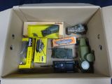 a box with a lot of toys inside of it