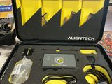 a black case with a yellow handle and wires in it