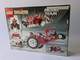 a box of legos with a picture of a man driving a car