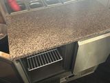 an image of a kitchen with a stove and a sink