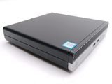 the back of a black laptop computer sitting on top of a white surface