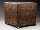 an image of a brown and black box sitting on top of a table