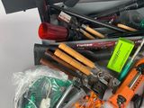 a lot of tools that are laying out on the table