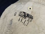 a close up of a jacket with a cow on it