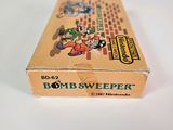 an old box of bomb sweeper on a white surface