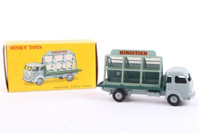 a toy truck with a box on the back of it