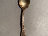 a spoon that is sitting on a table