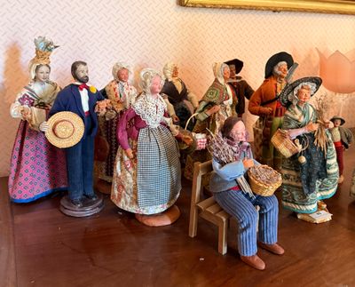 many figurines that are sitting on a table
