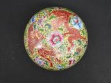 a chinese cloise enamel box decorated with a dragon and flowers