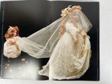 a book with a picture of a bride and a doll in it