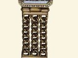 a watch that is sitting on top of a table