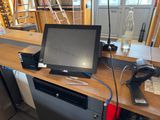 an image of a computer on a desk in a room