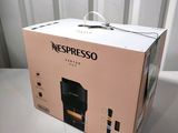 a box that has a coffee maker inside of it