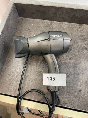 Un sèche cheveux de marque TGR3600XS Velecta Paramount Paris…