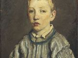 portrait of a young boy in a striped shirt and bow tie