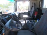 a view of the inside of a truck with the driver ' s seat up