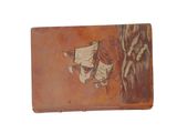 an old suitcase with a painting of a ship on it