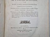 an open book with a black and white title on it
