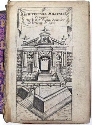 un vieux livre sur lequel est dessiné un bâtiment