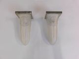 pair of silver plated wall sconces with carved design