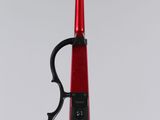 red and black violin ornament hanging from a string
