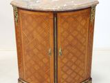 an image of a corner cabinet with a marble top