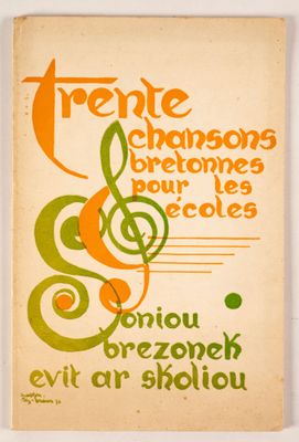 un gros plan sur la couverture d'un livre représentant un arbre et une note de musique