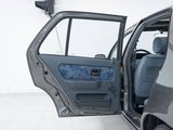 a car that has its door open on the floor