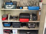 many different types of tools on the shelves in the closet