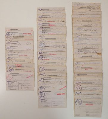 a lot of old papers that are on the wall