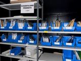 many bins of various items on the shelves