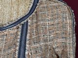 an image of a close up of a jacket on a mannequin mannequin